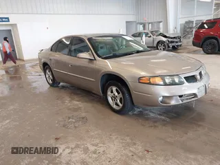 2002 Pontiac Bonneville SE z VIN 1G2HX54K424128538, wystawiony jako IAAI lot #41606130 z przebiegiem 147 048 mil mil oraz . Historia ofert i sprzedaży dostępna na DreamBid. Obrazek 1.