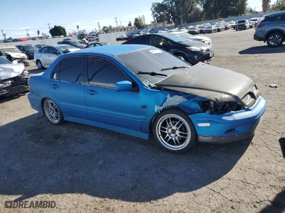2002 Mitsubishi Lancer OZ-Rally with VIN JA3AJ86E62U070034, listed as a Copart auction lot 86914144 with 180,675 mi miles and Salvage Title. Bid and sale history available at carsss.com. Image 4.