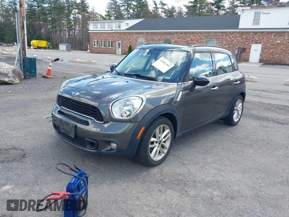 2014 MINI Countryman S with VIN WMWZC3C58EWP27041, listed as a IAAI auction lot 42082489 with 77,749 mi miles and . Bid and sale history available at DreamBid. Image 2.