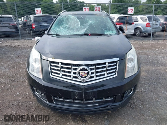 2015 Cadillac SRX Performance Collection with VIN 3GYFNFE35FS591343, listed as a IAAI auction lot 42644949 with 118,718 mi miles and . Bid and sale history available at DreamBid. Image 13.