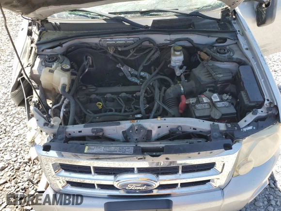 2011 Ford Escape XLS с VIN 1FMCU0C77BKB53875, выставлен на аукционе Copart как лот 53185705 с пробегом 222 070 миль миль и Списание • Salvage title. История ставок и продаж доступна на DreamBid. Изображение 14.