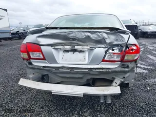 2002 Infiniti I35 Luxury with VIN JNKDA31A22T005398, listed as a IAAI auction lot 41818757 with 165,228 mi miles. Bid and sale history available at carsss.com. Image 6.