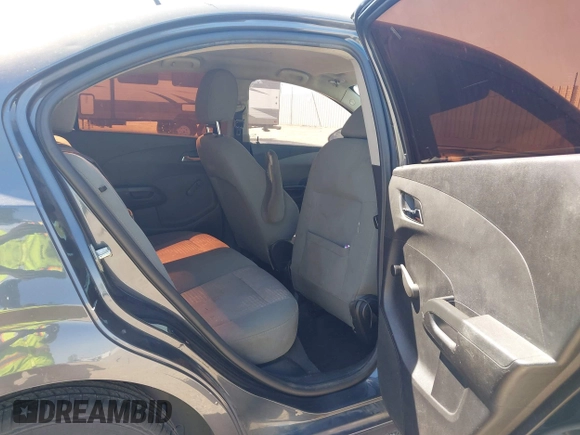 2013 Chevrolet Sonic LS with VIN 1G1JA5SH2D4112064, listed as a IAAI auction lot 42043168 with 215,480 mi miles and . Bid and sale history available at DreamBid. Image 8.