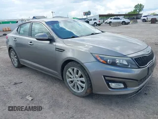 2015 Kia Optima LX with VIN 5XXGM4A75FG387822, listed as a IAAI auction lot 42214572 with 165,243 mi miles and . Bid and sale history available at DreamBid. Image 1.