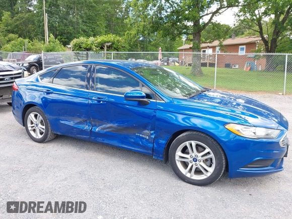 2018 Ford Fusion SE z VIN 3FA6P0LU9JR171096, wystawiony jako IAAI lot #42329683 z przebiegiem 126 463 mil mil oraz . Historia ofert i sprzedaży dostępna na DreamBid. Obrazek 6.