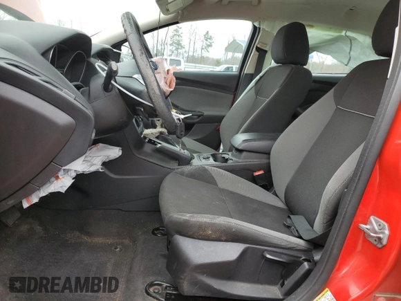 2014 Ford Focus SE with VIN 1FADP3F27EL243095, listed as a Copart auction lot 48289435 with 94,857 mi miles and Salvage Title. Bid and sale history available at DreamBid. Image 7.