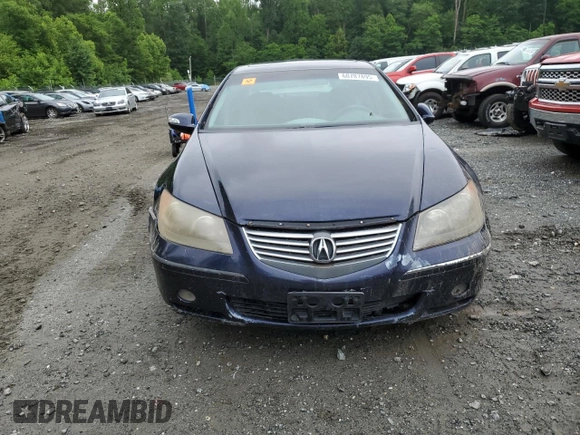 2005 Acura RL z VIN JH4KB16515C014781, wystawiony jako Copart lot #60787895 z przebiegiem Nie podano mil oraz Szkoda całkowita • Salvage title. Historia ofert i sprzedaży dostępna na DreamBid. Obrazek 5.