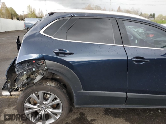 2020 Mazda CX-30 Premium z VIN 3MVDMBEM8LM121954, wystawiony jako Copart lot #51322965 z przebiegiem Nie podano mil oraz Nie do naprawy • Non repairable. Historia ofert i sprzedaży dostępna na DreamBid. Obrazek 10.