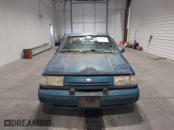 1993 Ford Tempo z VIN 1FAPP31X5PK229656, wystawiony jako IAAI lot #41788568 z przebiegiem 64 620 mil mil oraz . Historia ofert i sprzedaży dostępna na DreamBid. Obrazek 6.
