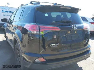 2018 Toyota RAV4 LE with VIN 2T3BFREV1JW827888, listed as a IAAI auction lot 41901303 with 181,279 mi miles. Bid and sale history available at carsss.com. Image 3.