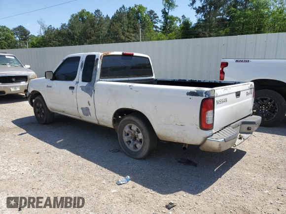 1999 Nissan Frontier XE with VIN 1N6DD26S3XC326231, listed as a Copart auction lot 51710615 with 228,174 mi miles and Salvage title. Bid and sale history available at DreamBid. Image 2.