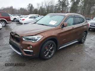 2016 BMW X1 xDrive28i with VIN WBXHT3C31GP881488, listed as a IAAI auction lot 41693116 with 120,922 mi miles. Bid and sale history available at carsss.com. Image 17.