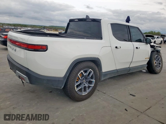 2022 Rivian R1T Adventure z VIN 7FCTGAAA8NN013508, wystawiony jako Copart lot #50834485 z przebiegiem Nie podano mil oraz Szkody całkowita. Historia ofert i sprzedaży dostępna na DreamBid. Obrazek 3.