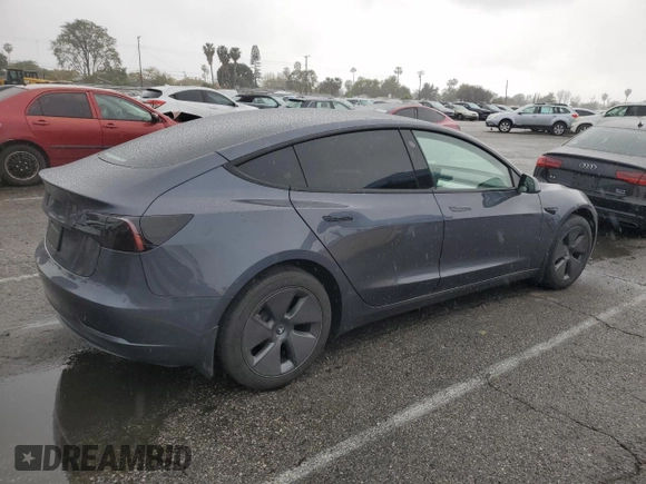2023 Tesla Model 3 with VIN 5YJ3E1EA5PF640805, listed as a Copart auction lot 48389265 with 28,193 mi miles and Salvage title. Bid and sale history available at DreamBid. Image 3.