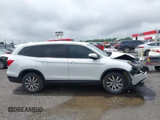 2020 Honda Pilot EX-L z VIN 5FNYF6H57LB067852, wystawiony jako IAAI lot #42172590 z przebiegiem 109 026 mil mil oraz . Historia ofert i sprzedaży dostępna na DreamBid. Obrazek 14.