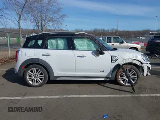 2019 MINI Countryman Cooper with VIN WMZYV5C55K3E05106, listed as a IAAI auction lot 41514627 with 69,399 mi miles. Bid and sale history available at carsss.com. Image 14.