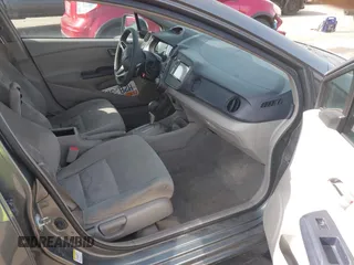 2010 Honda Insight EX with VIN JHMZE2H71AS032532, listed as a IAAI auction lot 41988221 with 333,144 mi miles and . Bid and sale history available at DreamBid. Image 5.