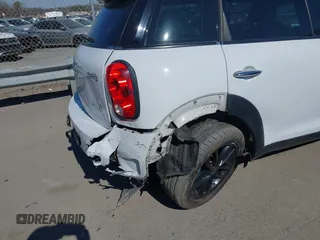 2014 MINI Countryman S with VIN WMWZC3C52EWP25060, listed as a IAAI auction lot 41642855 with 240,396 mi miles and . Bid and sale history available at DreamBid. Image 6.
