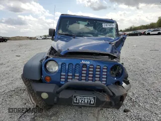 2009 Jeep Wrangler Unlimited Rubicon with VIN 1J4GA69169L762992, listed as a Copart auction lot 51674355 with 147,181 mi miles and Salvage title. Bid and sale history available at DreamBid. Image 5.