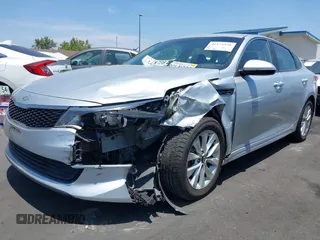2018 Kia Optima LX with VIN 5XXGT4L35JG266892, listed as a IAAI auction lot 42473938 with 79,690 mi miles and . Bid and sale history available at DreamBid. Image 2.