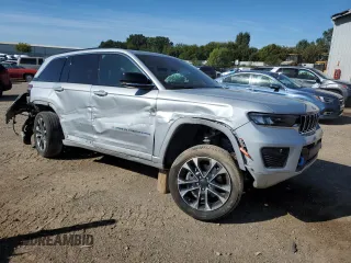 2022 Jeep Grand Cherokee Overland with VIN 1C4RJYD64N8756960, listed as a Copart auction lot 69174624 with 23,249 mi miles and Salvage title. Bid and sale history available at DreamBid. Image 4.