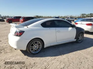 2009 Scion tC with VIN JTKDE167990297899, listed as a Copart auction lot 48591365 with 122,056 mi miles and Salvage Title. Bid and sale history available at carsss.com. Image 3.