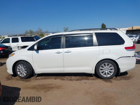 2011 Toyota Sienna XLE AAS with VIN 5TDYK3DCXBS097582, listed as a IAAI auction lot 42233594 with 226,902 mi miles and . Bid and sale history available at DreamBid. Image 14.