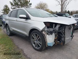 2019 Ford Edge Titanium z VIN 2FMPK4K90KBB94344, wystawiony jako IAAI lot #41973323 z przebiegiem 94 504 mil mil oraz . Historia ofert i sprzedaży dostępna na DreamBid. Obrazek 1.