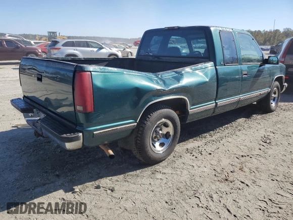 1996 GMC Sierra 1500 with VIN 2GTEC19W4T1542916, listed as a Copart auction lot 75097274 with 310,745 mi miles and Salvage Title. Bid and sale history available at DreamBid. Image 3.