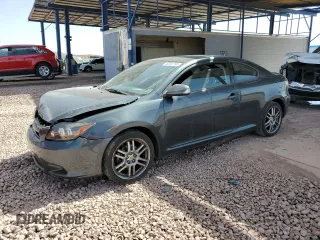 2010 Scion tC with VIN JTKDE3B70A0312506, listed as a Copart auction lot 48233795 with 134,695 mi miles and Salvage Title. Bid and sale history available at carsss.com. Image 1.