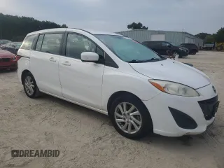 2012 Mazda 5 Sport with VIN JM1CW2BL4C0141205, listed as a Copart auction lot 71437504 with 135,271 mi miles and Salvage Title. Bid and sale history available at DreamBid. Image 4.