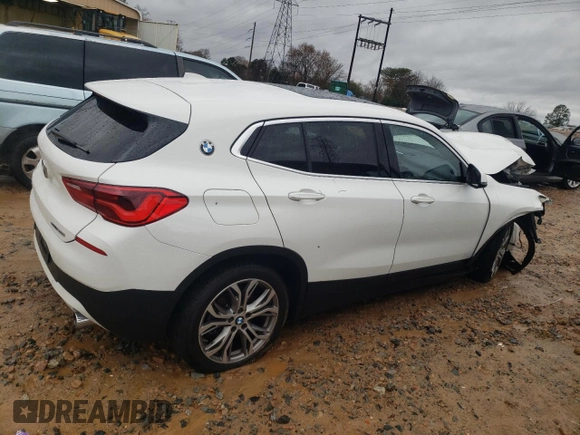 2020 BMW X2 sDrive28i with VIN WBXYH9C08L5P33368, listed as a Copart auction lot 69129512 with 66,918 mi miles. Bid and sale history available at carsss.com. Image 3.