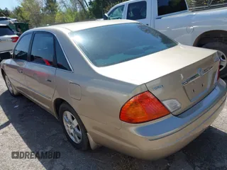 2002 Toyota Avalon XL with VIN 4T1BF28B62U261312, listed as a IAAI auction lot 41957062 with 233,443 mi miles. Bid and sale history available at carsss.com. Image 3.