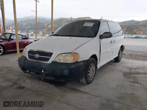 2003 Kia Sedona LX with VIN KNDUP131536402900, listed as a IAAI auction lot 41500260 with 143,825 mi miles and . Bid and sale history available at DreamBid. Image 2.