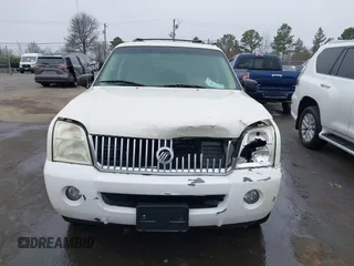 2002 Mercury Mountaineer Convenience z VIN 4M2ZU86W12ZJ35003, wystawiony jako IAAI lot #41193635 z przebiegiem 168 601 mil mil oraz . Historia ofert i sprzedaży dostępna na DreamBid. Obrazek 12.