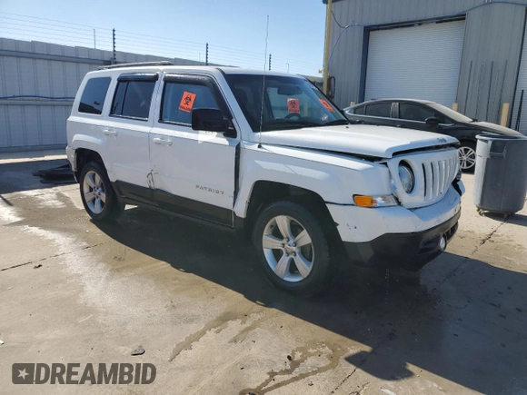 2015 Jeep Patriot High Altitude with VIN 1C4NJRFB5FD169156, listed as a Copart auction lot 50393335 with 122,233 mi miles and Salvage title. Bid and sale history available at DreamBid. Image 4.