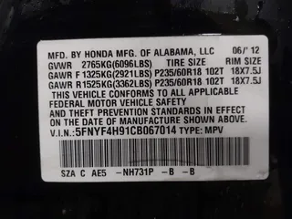 2012 Honda Pilot Touring with VIN 5FNYF4H91CB067014, listed as a IAAI auction lot 41749402 with 151,248 mi miles. Bid and sale history available at carsss.com. Image 9.