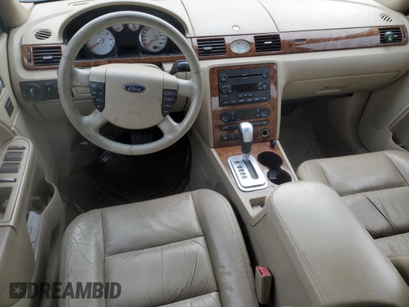 2007 Ford Five Hundred Limited z VIN 1FAHP28177G132462, wystawiony jako Copart lot #84824184 z przebiegiem Nie podano mil oraz Szkoda całkowita • Salvage title. Historia ofert i sprzedaży dostępna na DreamBid. Obrazek 8.