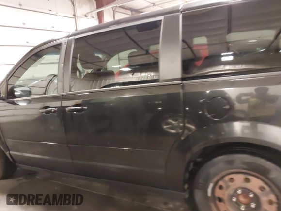 2015 Dodge Grand Caravan SXT with VIN 2C4RDGCG8FR518739, listed as a IAAI auction lot 41704911 with 278,478 mi miles and . Bid and sale history available at DreamBid. Image 15.