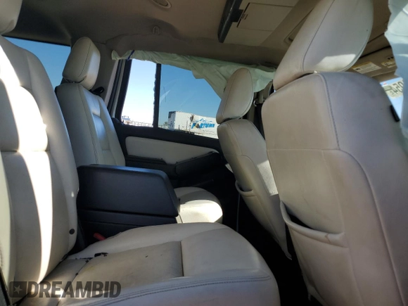 2009 Mercury Mountaineer Premier with VIN 4M2EU38E19UJ00233, listed as a Copart auction lot 80706954 with 247,145 mi miles and Salvage Title. Bid and sale history available at carsss.com. Image 12.