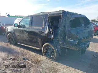 2014 GMC Yukon SLT with VIN 1GKS1CE00ER247249, listed as a IAAI auction lot 41271351 with 215,044 mi miles. Bid and sale history available at carsss.com. Image 3.