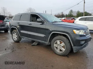 2011 Jeep Grand Cherokee Laredo with VIN 1J4RS4GG8BC508482, listed as a Copart auction lot 79261304 with 208,265 mi miles and Salvage Title. Bid and sale history available at DreamBid. Image 4.