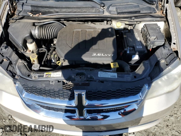2013 Dodge Grand Caravan SXT with VIN 2C4RDGCG5DR635014, listed as a Copart auction lot 49552925 with 194,929 mi miles and Clean Title. Bid and sale history available at DreamBid. Image 12.