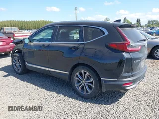 2021 Honda CR-V Touring with VIN 2HKRW2H96MH681908, listed as a IAAI auction lot 42082535 with 65,570 mi miles and . Bid and sale history available at DreamBid. Image 3.