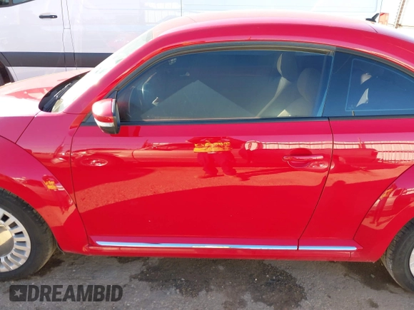 2013 Volkswagen Beetle with VIN 3VWHX7AT3DM682758, listed as a IAAI auction lot 40869170 with 88,793 mi miles and . Bid and sale history available at DreamBid. Image 14.
