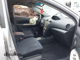 2008 Toyota Yaris with VIN JTDBT923881283264, listed as a IAAI auction lot 41622435 with 174,689 mi miles. Bid and sale history available at carsss.com. Image 5.