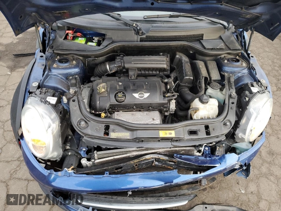 2014 MINI Convertible with VIN WMWZN3C53ET861225, listed as a Copart auction lot 87791665 with 104,151 mi miles and Salvage title. Bid and sale history available at DreamBid. Image 11.