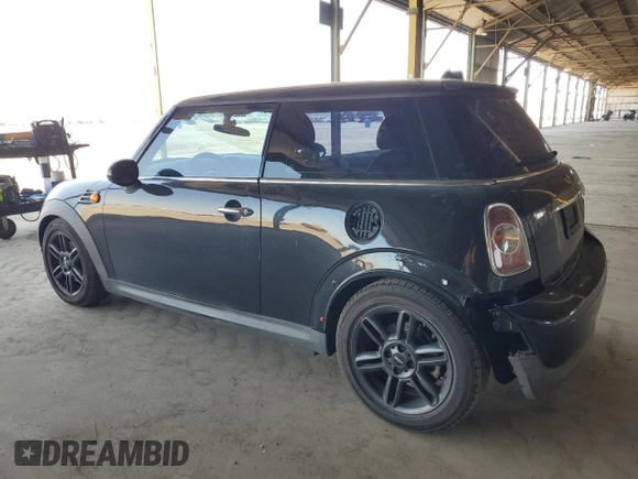 2011 MINI Hardtop z VIN WMWSU3C54BT253827, wystawiony jako Copart lot #57712835 z przebiegiem 150 016 mil mil oraz Czysty tytuł • Clean title. Historia ofert i sprzedaży dostępna na DreamBid. Obrazek 2.