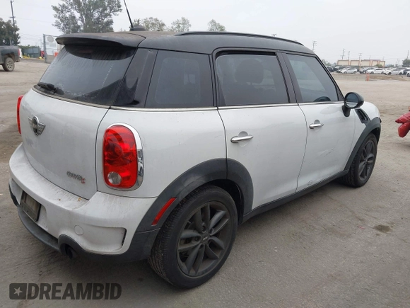 2011 MINI Countryman S with VIN WMWZC3C52BWL78647, listed as a IAAI auction lot 42459886 with 142,407 mi miles and . Bid and sale history available at DreamBid. Image 4.