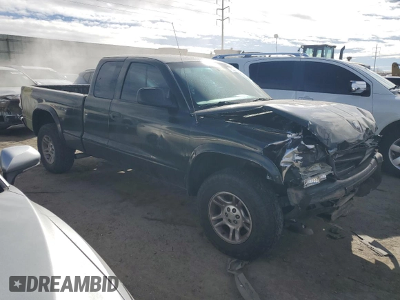2004 Dodge Dakota SLT with VIN 1D7HG42N44S749267, listed as a Copart auction lot 89313825 with 215,047 mi miles and Salvage Title. Bid and sale history available at carsss.com. Image 4.